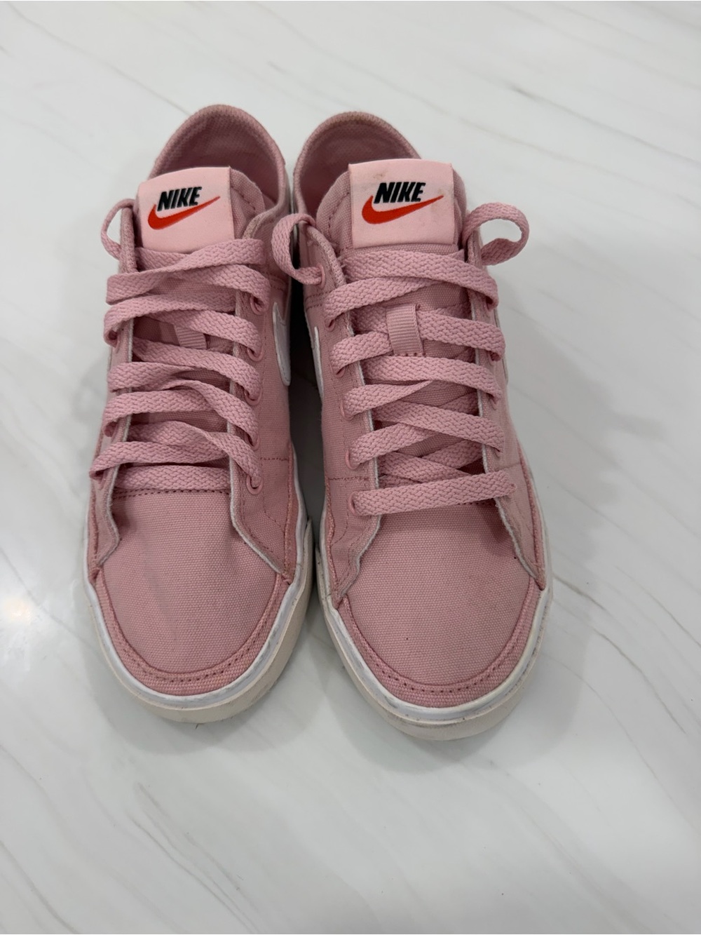 Nike Women's Pink Low-Top Canvas Sneakers